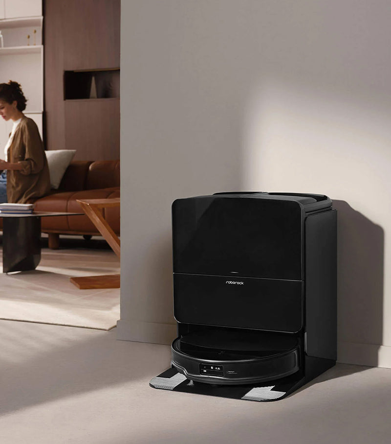 Robotic vacuum cleaner in a modern living room setting - Saros 10R
